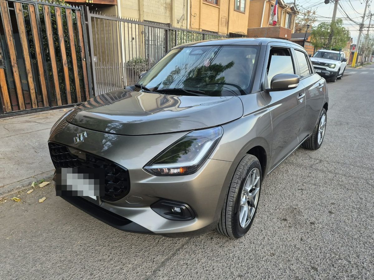 Suzuki Swift gris entregado